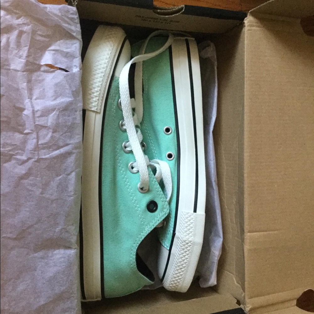 Converse low top on beach glass (with two tongues)